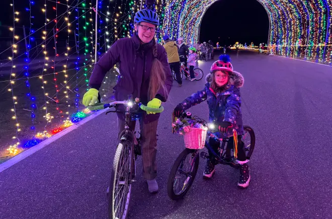 Mother and Daughter Enjoying Winter Wonderland's Bike the Lights