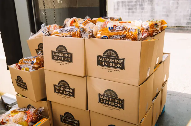 Sunshine Division Boxes Filled with Franz Bread Are Stacked in a Warehouse